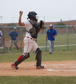Baseball catcher throwing the ball